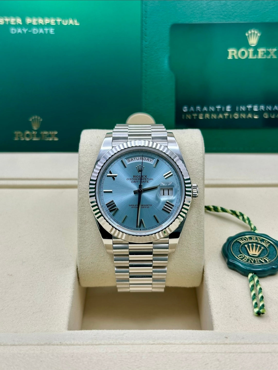 Rolex Day-Date 40 Ice-Blue Roman Dial Dial Fluted Bezel Platinum President Men's Watch 228236