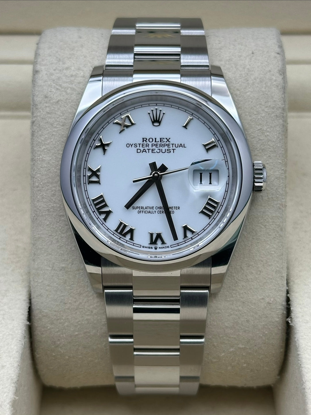 Rolex Datejust 126200 with white Roman dial and Oyster bracelet