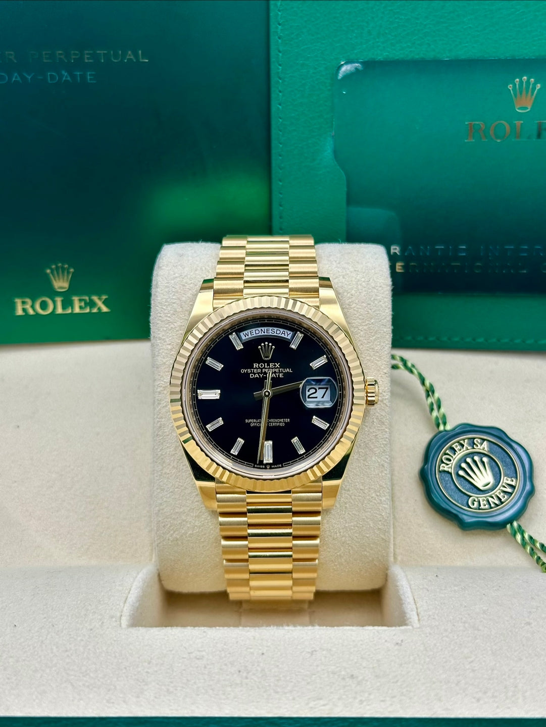 Rolex Day-Date 228238, 2025, black baguette dial, President bracelet