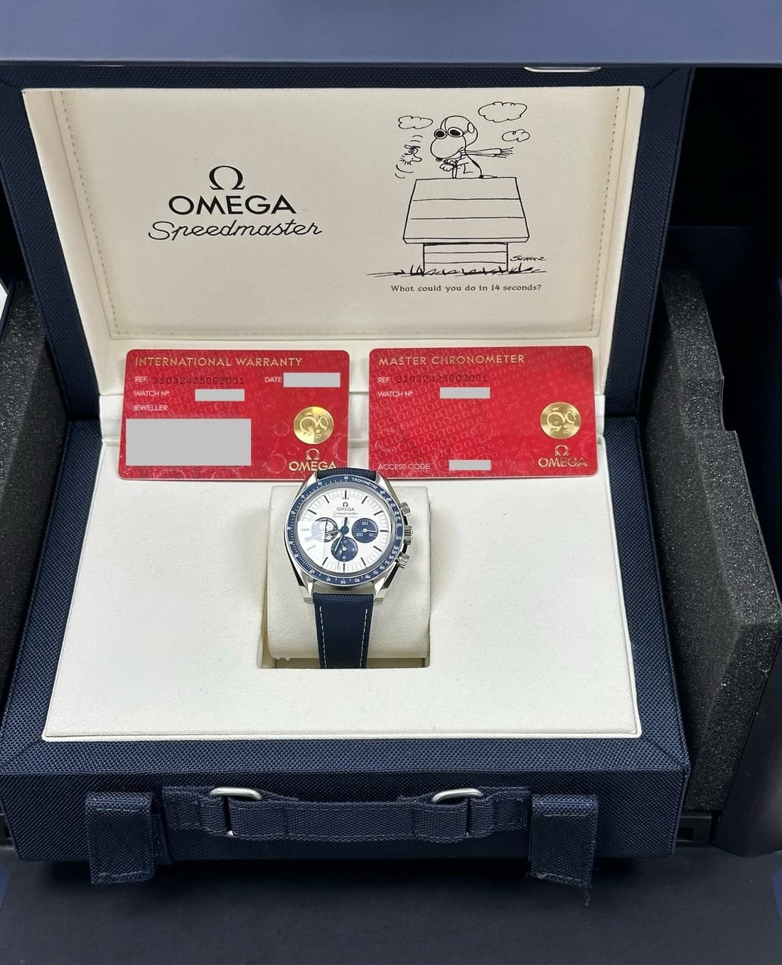 Omega Speedmaster Anniversary Series Silver Snoopy Award - 42 mm Steel Case - White Dial - 310.32.42.50.02.001